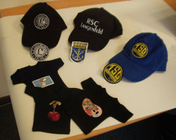 Textilveredelung T-Shirts und Baseballkappen